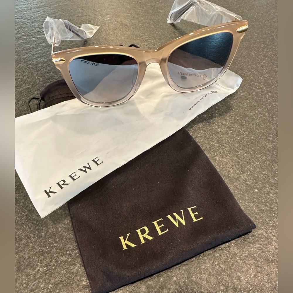 Brand new mirrored  Krewe glasses.